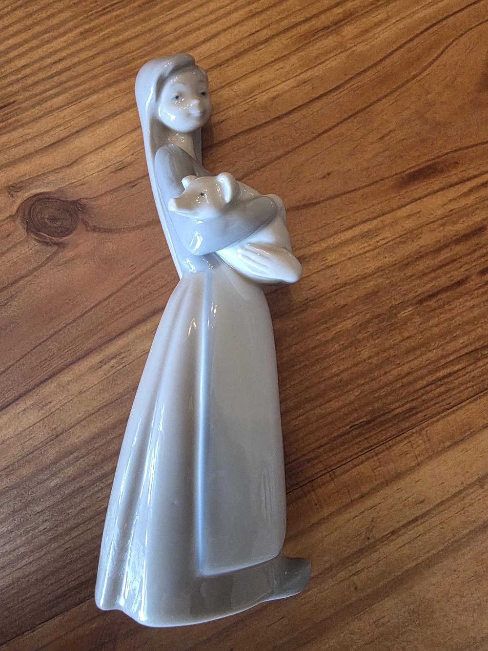 Laredo White Gloss Porcelain Woman Figurine Holding Pig
